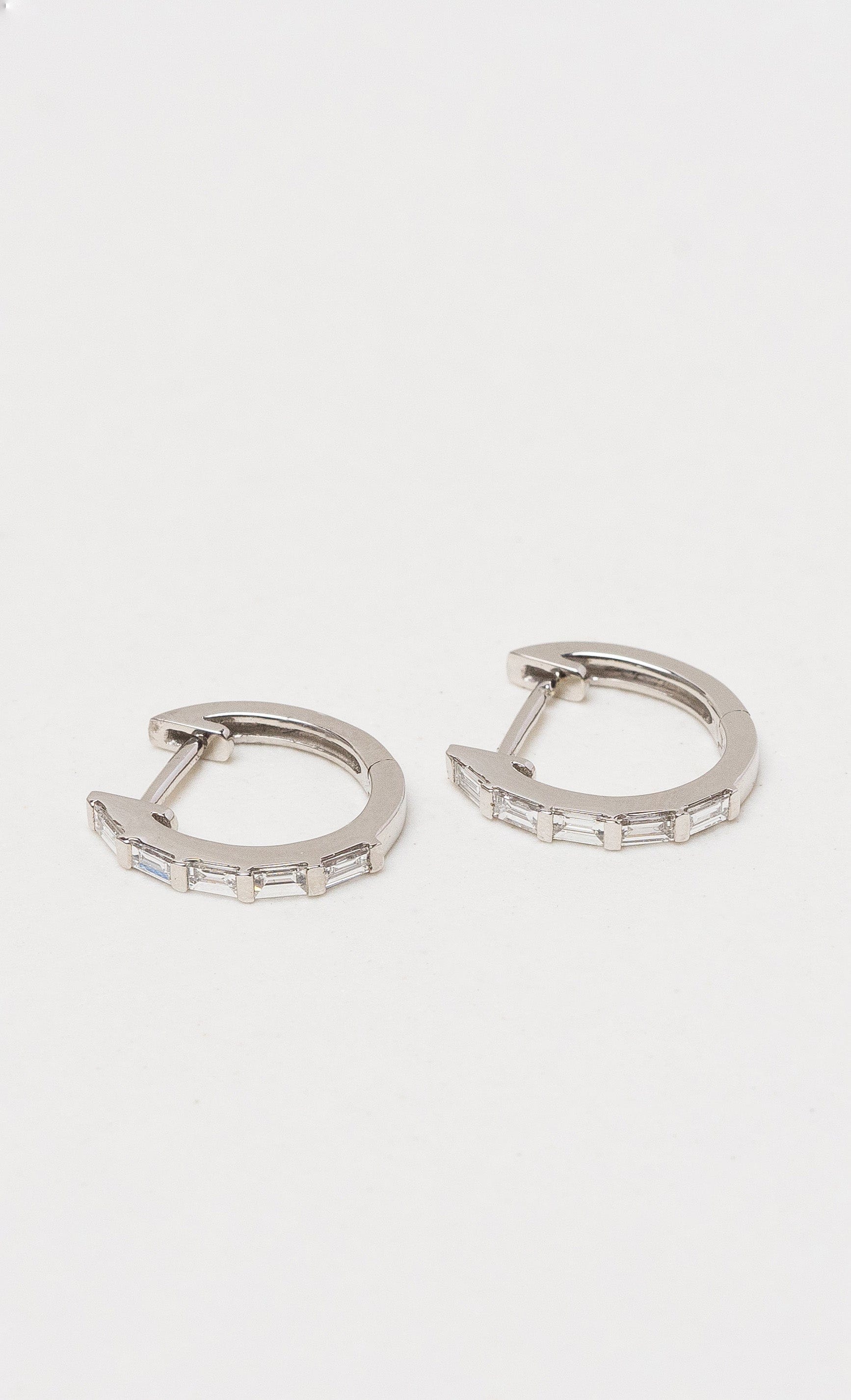 Diamond huggie hot sale earrings 18k