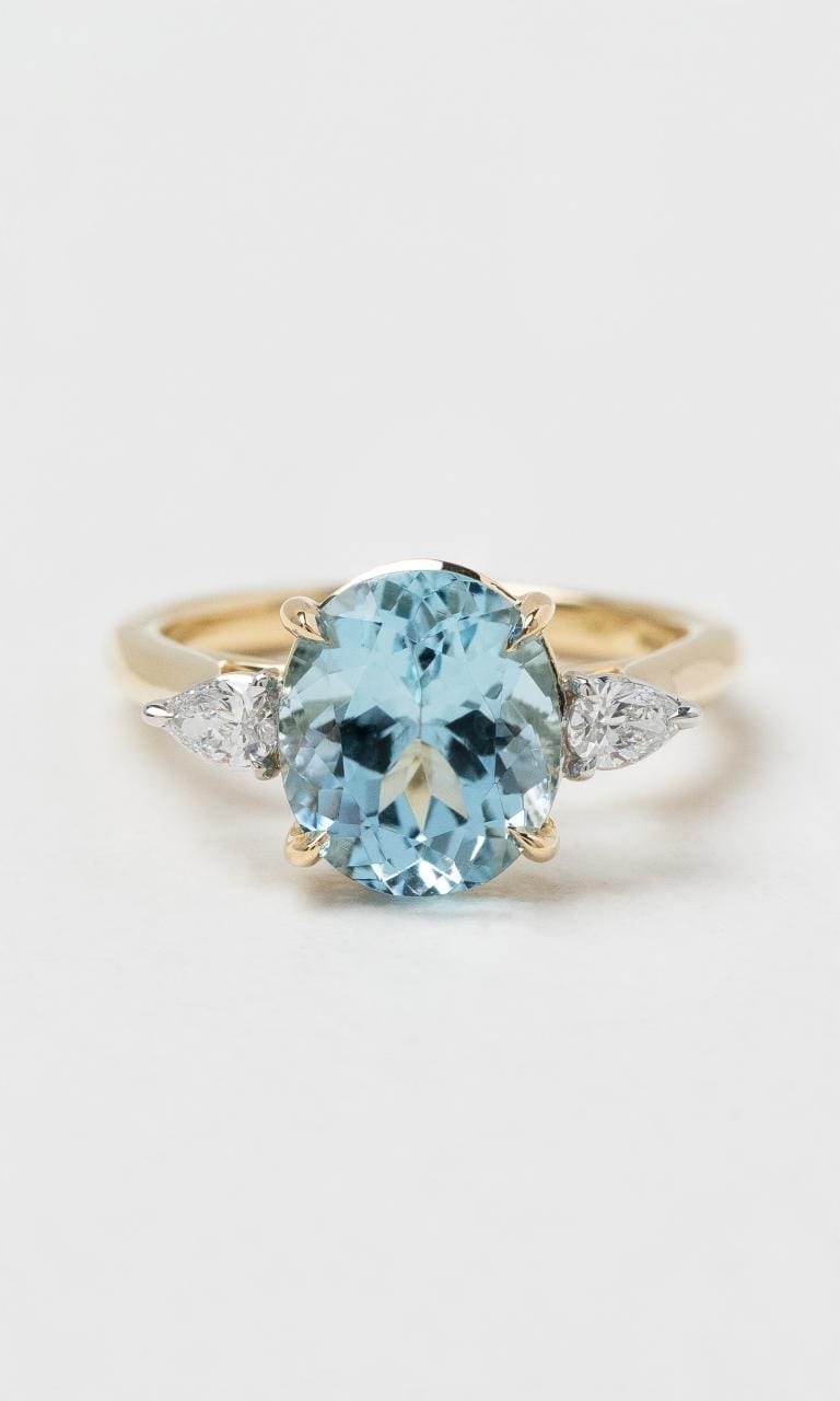 2024 © Hogans Family Jewellers 18K YWG Oval Aquamarine & Diamond Trilogy Ring