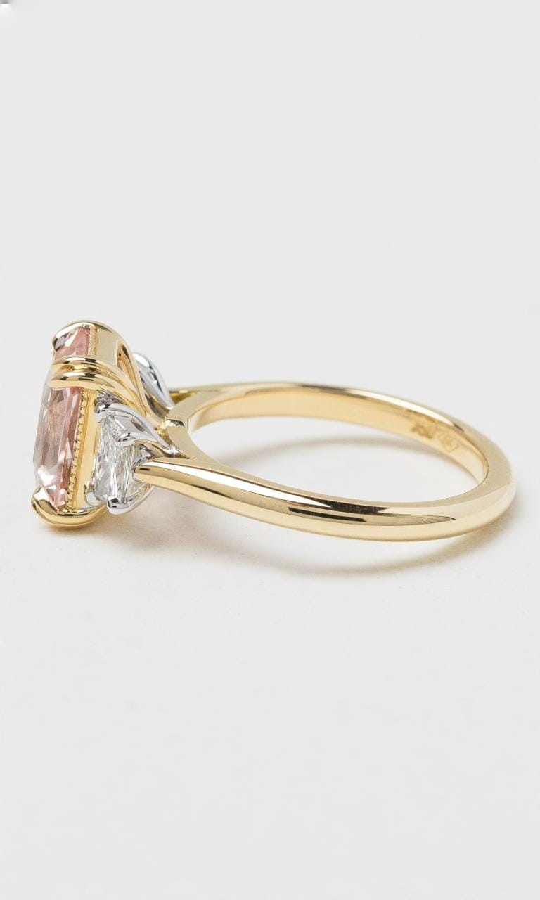 2024 © Hogans Family Jewellers 18K YWG Radiant Peach Sapphire & Diamond Trilogy Ring